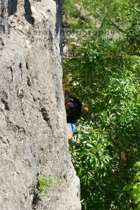 Javier Morales leading up Nose Print on the Windshield (5.11c), shot from the top of Ack! (5.11b, but using the crack for the start instead) that I top roped up with my camera on my back.  It was another long day of rock climbing at Seismic Wall on Austin's Barton Creek Greenbelt, Sunday, April 5, 2009.

Filename: SRM_20090405_13055496.jpg
Aperture: f/6.3
Shutter Speed: 1/400
Body: Canon EOS-1D Mark II
Lens: Canon EF 80-200mm f/2.8 L