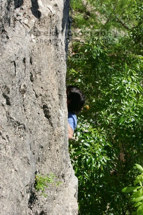 Javier Morales leading up Nose Print on the Windshield (5.11c), shot from the top of Ack! (5.11b, but using the crack for the start instead) that I top roped up with my camera on my back.  It was another long day of rock climbing at Seismic Wall on Austin's Barton Creek Greenbelt, Sunday, April 5, 2009.

Filename: SRM_20090405_13055799.jpg
Aperture: f/6.3
Shutter Speed: 1/400
Body: Canon EOS-1D Mark II
Lens: Canon EF 80-200mm f/2.8 L