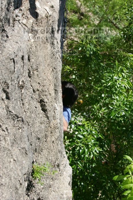 Javier Morales leading up Nose Print on the Windshield (5.11c), shot from the top of Ack! (5.11b, but using the crack for the start instead) that I top roped up with my camera on my back.  It was another long day of rock climbing at Seismic Wall on Austin's Barton Creek Greenbelt, Sunday, April 5, 2009.

Filename: SRM_20090405_13055800.jpg
Aperture: f/7.1
Shutter Speed: 1/400
Body: Canon EOS-1D Mark II
Lens: Canon EF 80-200mm f/2.8 L