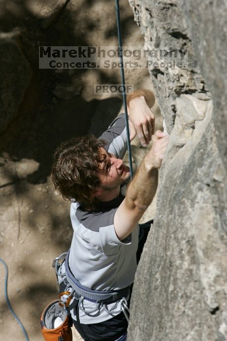 Andrew Dreher attempting the dyno while leading Lick the Window (5.10c), shot from the top of Ack! (5.11b, but using the crack for the start instead) that I top roped up with my camera on my back.  It was another long day of rock climbing at Seismic Wall on Austin's Barton Creek Greenbelt, Sunday, April 5, 2009.

Filename: SRM_20090405_13171032.jpg
Aperture: f/9.0
Shutter Speed: 1/500
Body: Canon EOS-1D Mark II
Lens: Canon EF 80-200mm f/2.8 L