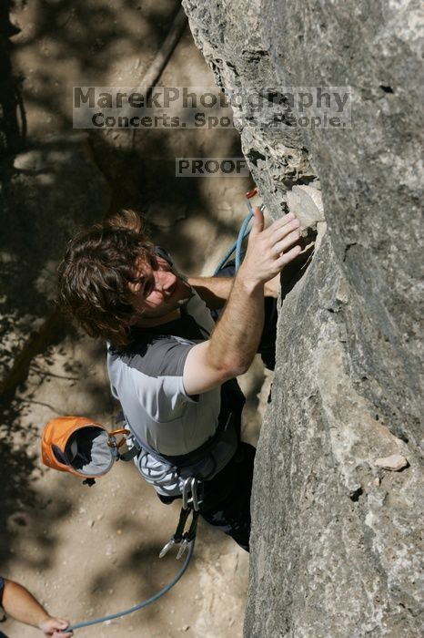 Andrew Dreher leading Lick the Window (5.10c), shot from the top of Ack! (5.11b, but using the crack for the start instead) that I top roped up with my camera on my back.  It was another long day of rock climbing at Seismic Wall on Austin's Barton Creek Greenbelt, Sunday, April 5, 2009.

Filename: SRM_20090405_13213652.jpg
Aperture: f/11.0
Shutter Speed: 1/500
Body: Canon EOS-1D Mark II
Lens: Canon EF 80-200mm f/2.8 L