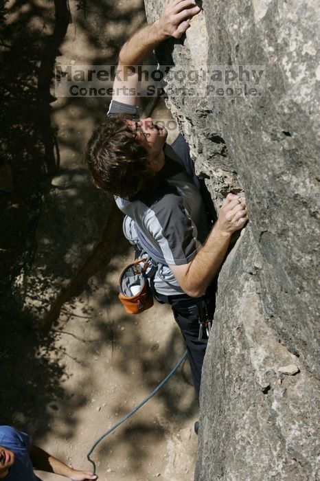 Andrew Dreher leading Lick the Window (5.10c), shot from the top of Ack! (5.11b, but using the crack for the start instead) that I top roped up with my camera on my back.  It was another long day of rock climbing at Seismic Wall on Austin's Barton Creek Greenbelt, Sunday, April 5, 2009.

Filename: SRM_20090405_13215059.jpg
Aperture: f/11.0
Shutter Speed: 1/500
Body: Canon EOS-1D Mark II
Lens: Canon EF 80-200mm f/2.8 L