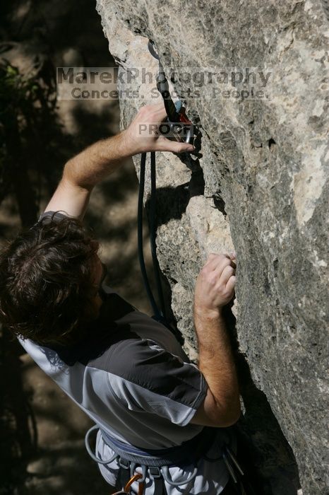 Andrew Dreher leading Lick the Window (5.10c), shot from the top of Ack! (5.11b, but using the crack for the start instead) that I top roped up with my camera on my back.  It was another long day of rock climbing at Seismic Wall on Austin's Barton Creek Greenbelt, Sunday, April 5, 2009.

Filename: SRM_20090405_13220168.jpg
Aperture: f/13.0
Shutter Speed: 1/500
Body: Canon EOS-1D Mark II
Lens: Canon EF 80-200mm f/2.8 L