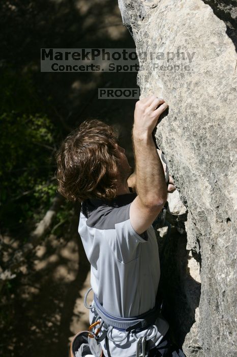 Andrew Dreher leading Lick the Window (5.10c), shot from the top of Ack! (5.11b, but using the crack for the start instead) that I top roped up with my camera on my back.  It was another long day of rock climbing at Seismic Wall on Austin's Barton Creek Greenbelt, Sunday, April 5, 2009.

Filename: SRM_20090405_13224283.jpg
Aperture: f/9.0
Shutter Speed: 1/500
Body: Canon EOS-1D Mark II
Lens: Canon EF 80-200mm f/2.8 L