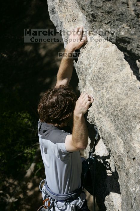 Andrew Dreher leading Lick the Window (5.10c), shot from the top of Ack! (5.11b, but using the crack for the start instead) that I top roped up with my camera on my back.  It was another long day of rock climbing at Seismic Wall on Austin's Barton Creek Greenbelt, Sunday, April 5, 2009.

Filename: SRM_20090405_13225388.jpg
Aperture: f/7.1
Shutter Speed: 1/500
Body: Canon EOS-1D Mark II
Lens: Canon EF 80-200mm f/2.8 L