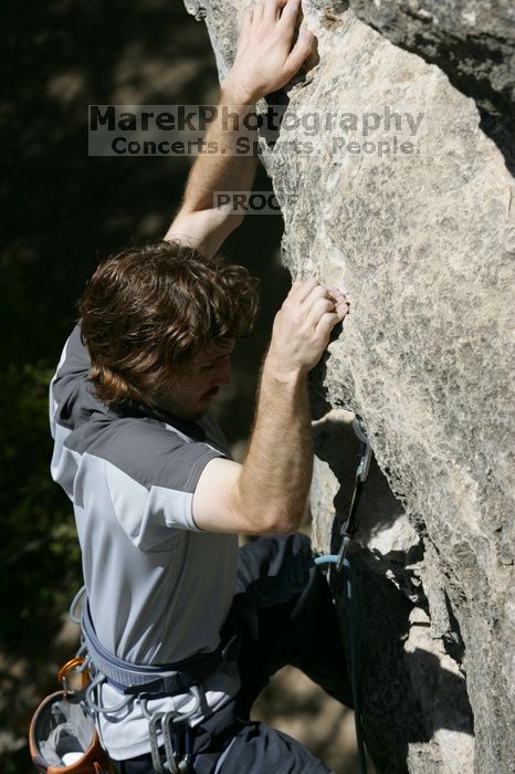 Andrew Dreher leading Lick the Window (5.10c), shot from the top of Ack! (5.11b, but using the crack for the start instead) that I top roped up with my camera on my back.  It was another long day of rock climbing at Seismic Wall on Austin's Barton Creek Greenbelt, Sunday, April 5, 2009.

Filename: SRM_20090405_13225590.jpg
Aperture: f/6.3
Shutter Speed: 1/500
Body: Canon EOS-1D Mark II
Lens: Canon EF 80-200mm f/2.8 L