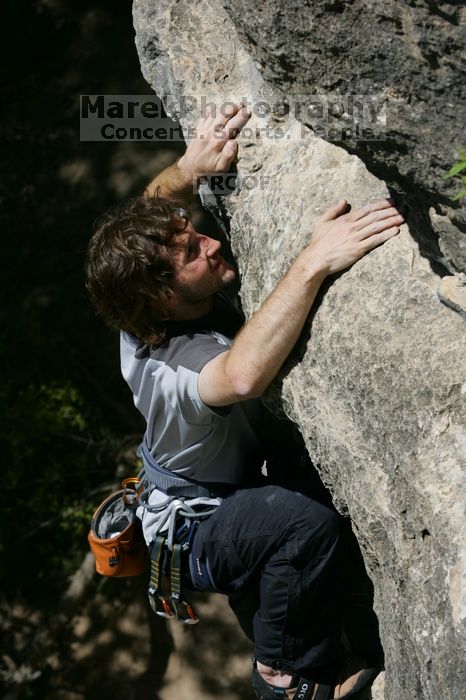 Andrew Dreher leading Lick the Window (5.10c), shot from the top of Ack! (5.11b, but using the crack for the start instead) that I top roped up with my camera on my back.  It was another long day of rock climbing at Seismic Wall on Austin's Barton Creek Greenbelt, Sunday, April 5, 2009.

Filename: SRM_20090405_13225700.jpg
Aperture: f/8.0
Shutter Speed: 1/500
Body: Canon EOS-1D Mark II
Lens: Canon EF 80-200mm f/2.8 L