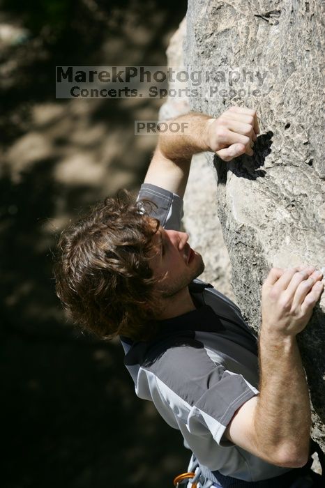 Andrew Dreher leading Lick the Window (5.10c), shot from the top of Ack! (5.11b, but using the crack for the start instead) that I top roped up with my camera on my back.  It was another long day of rock climbing at Seismic Wall on Austin's Barton Creek Greenbelt, Sunday, April 5, 2009.

Filename: SRM_20090405_13231518.jpg
Aperture: f/5.6
Shutter Speed: 1/500
Body: Canon EOS-1D Mark II
Lens: Canon EF 80-200mm f/2.8 L