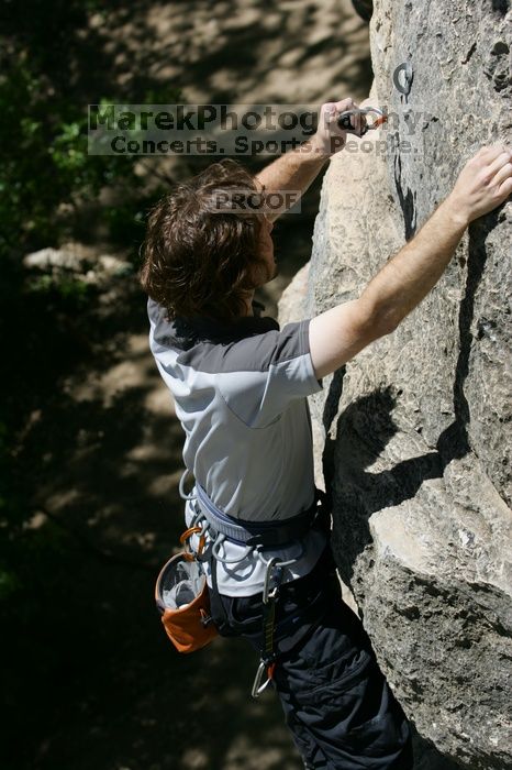 Andrew Dreher leading Lick the Window (5.10c), shot from the top of Ack! (5.11b, but using the crack for the start instead) that I top roped up with my camera on my back.  It was another long day of rock climbing at Seismic Wall on Austin's Barton Creek Greenbelt, Sunday, April 5, 2009.

Filename: SRM_20090405_13232325.jpg
Aperture: f/6.3
Shutter Speed: 1/500
Body: Canon EOS-1D Mark II
Lens: Canon EF 80-200mm f/2.8 L