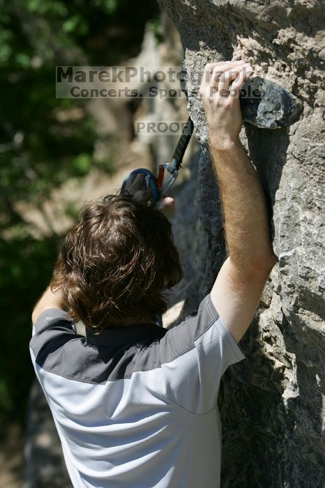 Andrew Dreher leading Lick the Window (5.10c), shot from the top of Ack! (5.11b, but using the crack for the start instead) that I top roped up with my camera on my back.  It was another long day of rock climbing at Seismic Wall on Austin's Barton Creek Greenbelt, Sunday, April 5, 2009.

Filename: SRM_20090405_13235533.jpg
Aperture: f/5.0
Shutter Speed: 1/500
Body: Canon EOS-1D Mark II
Lens: Canon EF 80-200mm f/2.8 L