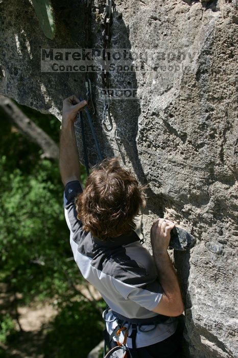 Andrew Dreher leading Lick the Window (5.10c), shot from the top of Ack! (5.11b, but using the crack for the start instead) that I top roped up with my camera on my back.  It was another long day of rock climbing at Seismic Wall on Austin's Barton Creek Greenbelt, Sunday, April 5, 2009.

Filename: SRM_20090405_13241136.jpg
Aperture: f/5.0
Shutter Speed: 1/500
Body: Canon EOS-1D Mark II
Lens: Canon EF 80-200mm f/2.8 L