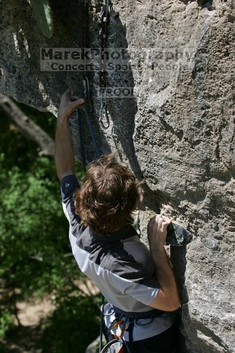 Andrew Dreher leading Lick the Window (5.10c), shot from the top of Ack! (5.11b, but using the crack for the start instead) that I top roped up with my camera on my back.  It was another long day of rock climbing at Seismic Wall on Austin's Barton Creek Greenbelt, Sunday, April 5, 2009.

Filename: SRM_20090405_13241237.jpg
Aperture: f/5.0
Shutter Speed: 1/500
Body: Canon EOS-1D Mark II
Lens: Canon EF 80-200mm f/2.8 L