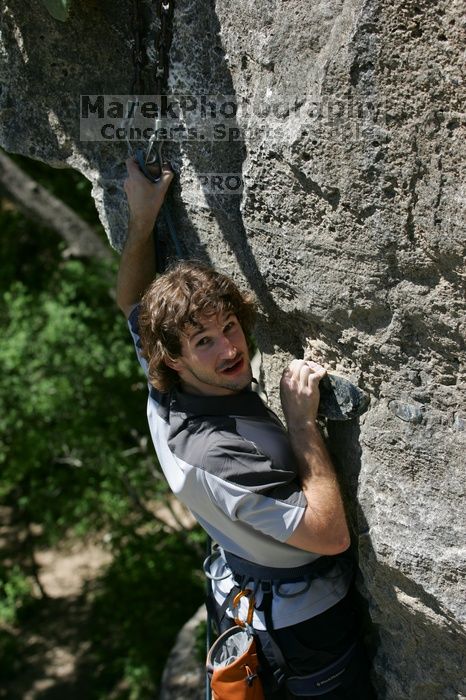 Andrew Dreher leading Lick the Window (5.10c), shot from the top of Ack! (5.11b, but using the crack for the start instead) that I top roped up with my camera on my back.  It was another long day of rock climbing at Seismic Wall on Austin's Barton Creek Greenbelt, Sunday, April 5, 2009.

Filename: SRM_20090405_13242241.jpg
Aperture: f/5.0
Shutter Speed: 1/500
Body: Canon EOS-1D Mark II
Lens: Canon EF 80-200mm f/2.8 L