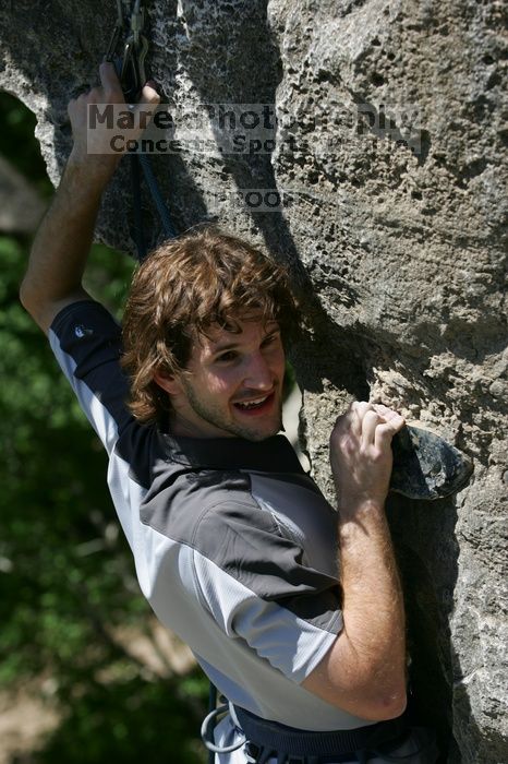 Andrew Dreher leading Lick the Window (5.10c), shot from the top of Ack! (5.11b, but using the crack for the start instead) that I top roped up with my camera on my back.  It was another long day of rock climbing at Seismic Wall on Austin's Barton Creek Greenbelt, Sunday, April 5, 2009.

Filename: SRM_20090405_13242243.jpg
Aperture: f/5.0
Shutter Speed: 1/500
Body: Canon EOS-1D Mark II
Lens: Canon EF 80-200mm f/2.8 L