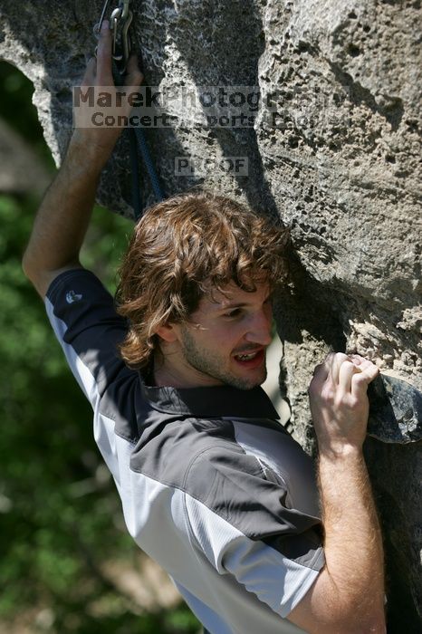 Andrew Dreher leading Lick the Window (5.10c), shot from the top of Ack! (5.11b, but using the crack for the start instead) that I top roped up with my camera on my back.  It was another long day of rock climbing at Seismic Wall on Austin's Barton Creek Greenbelt, Sunday, April 5, 2009.

Filename: SRM_20090405_13242344.jpg
Aperture: f/5.0
Shutter Speed: 1/500
Body: Canon EOS-1D Mark II
Lens: Canon EF 80-200mm f/2.8 L