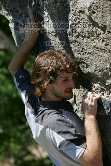 Andrew Dreher leading Lick the Window (5.10c), shot from the top of Ack! (5.11b, but using the crack for the start instead) that I top roped up with my camera on my back.  It was another long day of rock climbing at Seismic Wall on Austin's Barton Creek Greenbelt, Sunday, April 5, 2009.

Filename: SRM_20090405_13242345.jpg
Aperture: f/5.0
Shutter Speed: 1/500
Body: Canon EOS-1D Mark II
Lens: Canon EF 80-200mm f/2.8 L