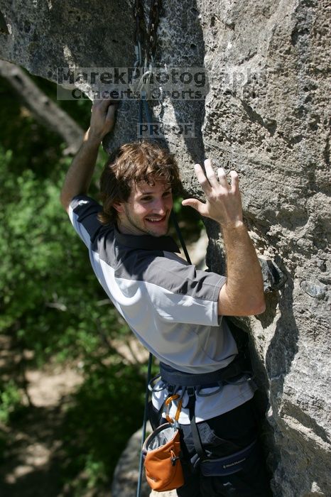 Andrew Dreher leading Lick the Window (5.10c), shot from the top of Ack! (5.11b, but using the crack for the start instead) that I top roped up with my camera on my back.  It was another long day of rock climbing at Seismic Wall on Austin's Barton Creek Greenbelt, Sunday, April 5, 2009.

Filename: SRM_20090405_13242748.jpg
Aperture: f/4.5
Shutter Speed: 1/500
Body: Canon EOS-1D Mark II
Lens: Canon EF 80-200mm f/2.8 L