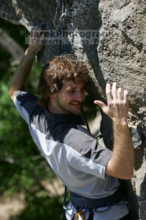 Andrew Dreher leading Lick the Window (5.10c), shot from the top of Ack! (5.11b, but using the crack for the start instead) that I top roped up with my camera on my back.  It was another long day of rock climbing at Seismic Wall on Austin's Barton Creek Greenbelt, Sunday, April 5, 2009.

Filename: SRM_20090405_13242750.jpg
Aperture: f/5.0
Shutter Speed: 1/500
Body: Canon EOS-1D Mark II
Lens: Canon EF 80-200mm f/2.8 L