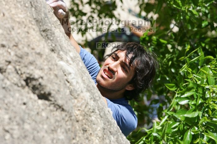 Javier Morales leading Nose Print on the Windshield (5.11c), shot from the top of Ack! (5.11b, but using the crack for the start instead) that I top roped up with my camera on my back.  It was another long day of rock climbing at Seismic Wall on Austin's Barton Creek Greenbelt, Sunday, April 5, 2009.

Filename: SRM_20090405_13334271.jpg
Aperture: f/8.0
Shutter Speed: 1/500
Body: Canon EOS-1D Mark II
Lens: Canon EF 80-200mm f/2.8 L