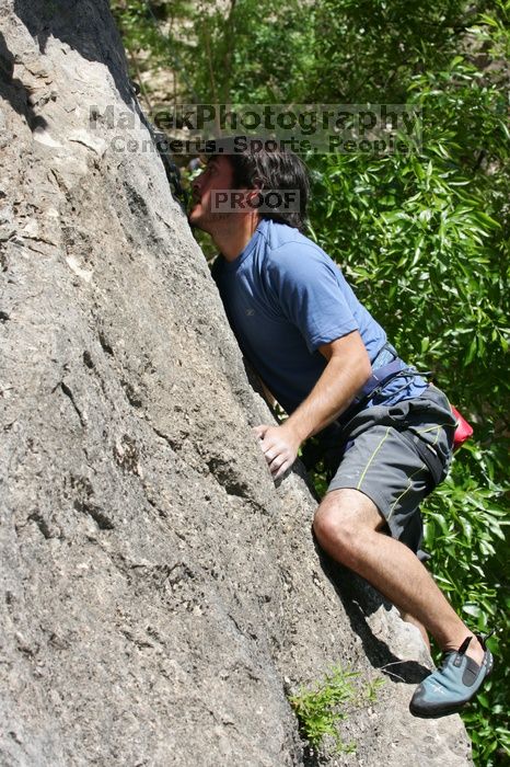 Javier Morales leading Nose Print on the Windshield (5.11c), shot from the top of Ack! (5.11b, but using the crack for the start instead) that I top roped up with my camera on my back.  It was another long day of rock climbing at Seismic Wall on Austin's Barton Creek Greenbelt, Sunday, April 5, 2009.

Filename: SRM_20090405_13341090.jpg
Aperture: f/9.0
Shutter Speed: 1/500
Body: Canon EOS-1D Mark II
Lens: Canon EF 80-200mm f/2.8 L