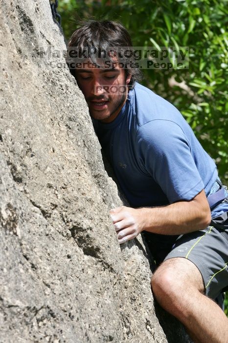 Javier Morales leading Nose Print on the Windshield (5.11c), shot from the top of Ack! (5.11b, but using the crack for the start instead) that I top roped up with my camera on my back.  It was another long day of rock climbing at Seismic Wall on Austin's Barton Creek Greenbelt, Sunday, April 5, 2009.

Filename: SRM_20090405_13341592.jpg
Aperture: f/9.0
Shutter Speed: 1/500
Body: Canon EOS-1D Mark II
Lens: Canon EF 80-200mm f/2.8 L