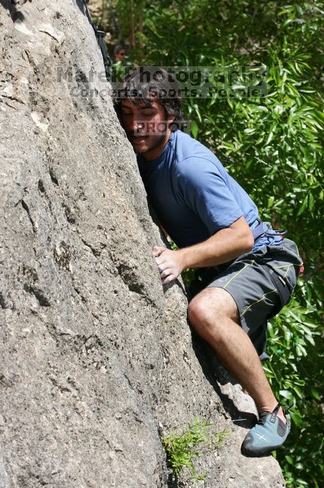 Javier Morales leading Nose Print on the Windshield (5.11c), shot from the top of Ack! (5.11b, but using the crack for the start instead) that I top roped up with my camera on my back.  It was another long day of rock climbing at Seismic Wall on Austin's Barton Creek Greenbelt, Sunday, April 5, 2009.

Filename: SRM_20090405_13342094.jpg
Aperture: f/9.0
Shutter Speed: 1/500
Body: Canon EOS-1D Mark II
Lens: Canon EF 80-200mm f/2.8 L