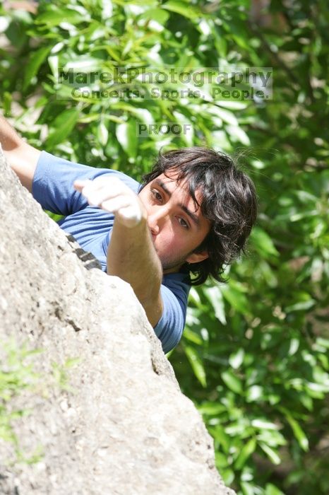 Javier Morales leading Nose Print on the Windshield (5.11c), shot from the top of Ack! (5.11b, but using the crack for the start instead) that I top roped up with my camera on my back.  It was another long day of rock climbing at Seismic Wall on Austin's Barton Creek Greenbelt, Sunday, April 5, 2009.

Filename: SRM_20090405_13365506.jpg
Aperture: f/6.3
Shutter Speed: 1/500
Body: Canon EOS-1D Mark II
Lens: Canon EF 80-200mm f/2.8 L