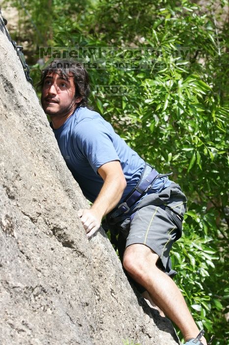 Javier Morales leading Nose Print on the Windshield (5.11c), shot from the top of Ack! (5.11b, but using the crack for the start instead) that I top roped up with my camera on my back.  It was another long day of rock climbing at Seismic Wall on Austin's Barton Creek Greenbelt, Sunday, April 5, 2009.

Filename: SRM_20090405_13371512.jpg
Aperture: f/7.1
Shutter Speed: 1/500
Body: Canon EOS-1D Mark II
Lens: Canon EF 80-200mm f/2.8 L