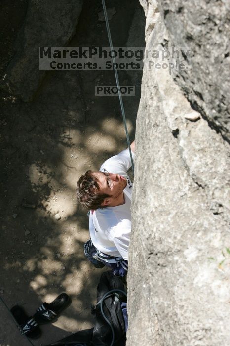 Me on the dyno while top roping Lick the Window (5.10c), shot (by Andrew Dreher) from the top of Ack! (5.11b, but using the crack for the start instead) that I top roped up with my camera on my back.  It was another long day of rock climbing at Seismic Wall on Austin's Barton Creek Greenbelt, Sunday, April 5, 2009.

Filename: SRM_20090405_14391435.jpg
Aperture: f/8.0
Shutter Speed: 1/500
Body: Canon EOS-1D Mark II
Lens: Canon EF 80-200mm f/2.8 L