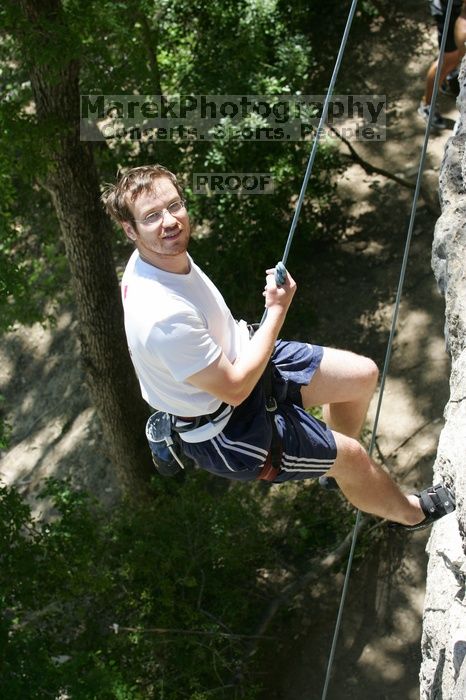 Me top roping Lick the Window (5.10c), shot (by Andrew Dreher) from the top of Ack! (5.11b, but using the crack for the start instead) that I top roped up with my camera on my back.  It was another long day of rock climbing at Seismic Wall on Austin's Barton Creek Greenbelt, Sunday, April 5, 2009.

Filename: SRM_20090405_14430672.jpg
Aperture: f/6.3
Shutter Speed: 1/500
Body: Canon EOS-1D Mark II
Lens: Canon EF 80-200mm f/2.8 L