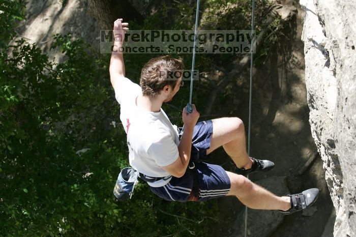 Me top roping Lick the Window (5.10c), shot (by Andrew Dreher) from the top of Ack! (5.11b, but using the crack for the start instead) that I top roped up with my camera on my back.  It was another long day of rock climbing at Seismic Wall on Austin's Barton Creek Greenbelt, Sunday, April 5, 2009.

Filename: SRM_20090405_14431673.jpg
Aperture: f/6.3
Shutter Speed: 1/500
Body: Canon EOS-1D Mark II
Lens: Canon EF 80-200mm f/2.8 L