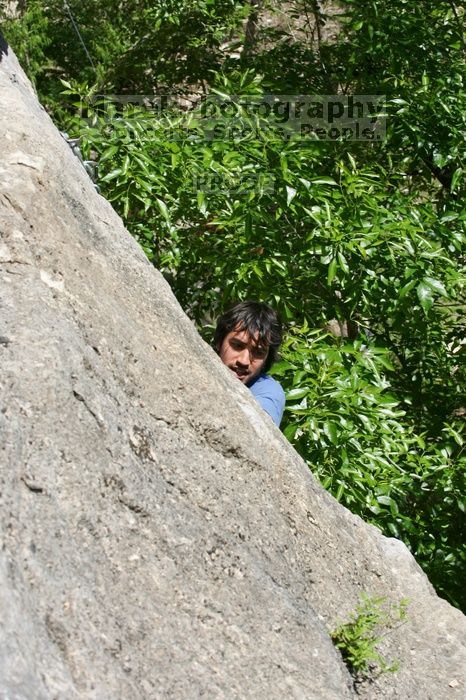 Javier Morales leading Nose Print on the Windshield (5.11c), shot from the top of Ack! (5.11b, but using the crack for the start instead) that I top roped up with my camera on my back.  It was another long day of rock climbing at Seismic Wall on Austin's Barton Creek Greenbelt, Sunday, April 5, 2009.

Filename: SRM_20090405_14545878.jpg
Aperture: f/10.0
Shutter Speed: 1/500
Body: Canon EOS-1D Mark II
Lens: Canon EF 80-200mm f/2.8 L