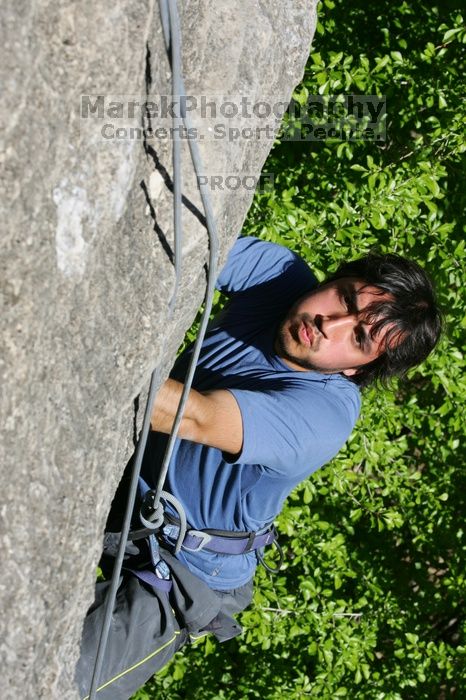 Javier Morales top rope climbing She's No Dog, She's My Wife (5.11b), shot from the top of Ack! (5.11b, but using the crack for the start instead) that I top roped up with my camera on my back.  It was another long day of rock climbing at Seismic Wall on Austin's Barton Creek Greenbelt, Sunday, April 5, 2009.

Filename: SRM_20090405_16172398.jpg
Aperture: f/11.0
Shutter Speed: 1/500
Body: Canon EOS-1D Mark II
Lens: Canon EF 80-200mm f/2.8 L