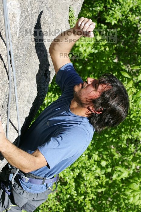 Javier Morales top rope climbing She's No Dog, She's My Wife (5.11b), shot from the top of Ack! (5.11b, but using the crack for the start instead) that I top roped up with my camera on my back.  It was another long day of rock climbing at Seismic Wall on Austin's Barton Creek Greenbelt, Sunday, April 5, 2009.

Filename: SRM_20090405_16174322.jpg
Aperture: f/8.0
Shutter Speed: 1/500
Body: Canon EOS-1D Mark II
Lens: Canon EF 80-200mm f/2.8 L