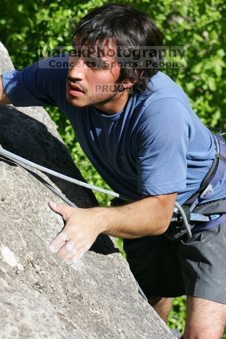 Javier Morales top rope climbing She's No Dog, She's My Wife (5.11b), shot from the top of Ack! (5.11b, but using the crack for the start instead) that I top roped up with my camera on my back.  It was another long day of rock climbing at Seismic Wall on Austin's Barton Creek Greenbelt, Sunday, April 5, 2009.

Filename: SRM_20090405_16183126.jpg
Aperture: f/8.0
Shutter Speed: 1/400
Body: Canon EOS-1D Mark II
Lens: Canon EF 80-200mm f/2.8 L