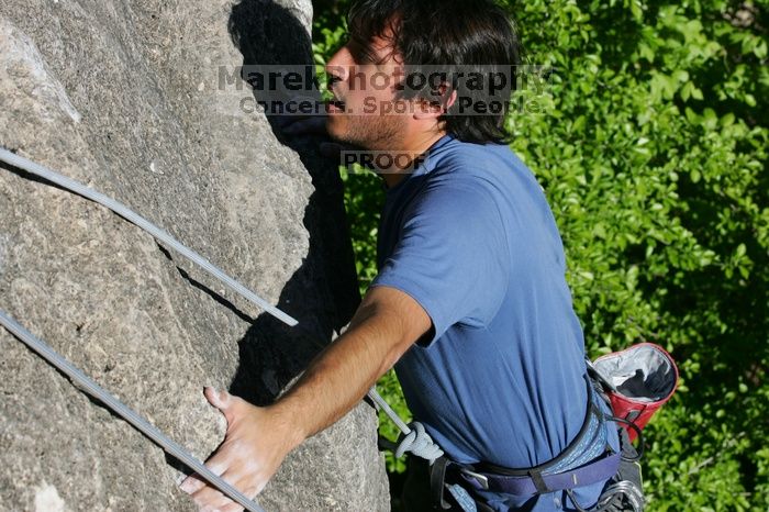 Javier Morales top rope climbing She's No Dog, She's My Wife (5.11b), shot from the top of Ack! (5.11b, but using the crack for the start instead) that I top roped up with my camera on my back.  It was another long day of rock climbing at Seismic Wall on Austin's Barton Creek Greenbelt, Sunday, April 5, 2009.

Filename: SRM_20090405_16482452.jpg
Aperture: f/9.0
Shutter Speed: 1/500
Body: Canon EOS-1D Mark II
Lens: Canon EF 80-200mm f/2.8 L