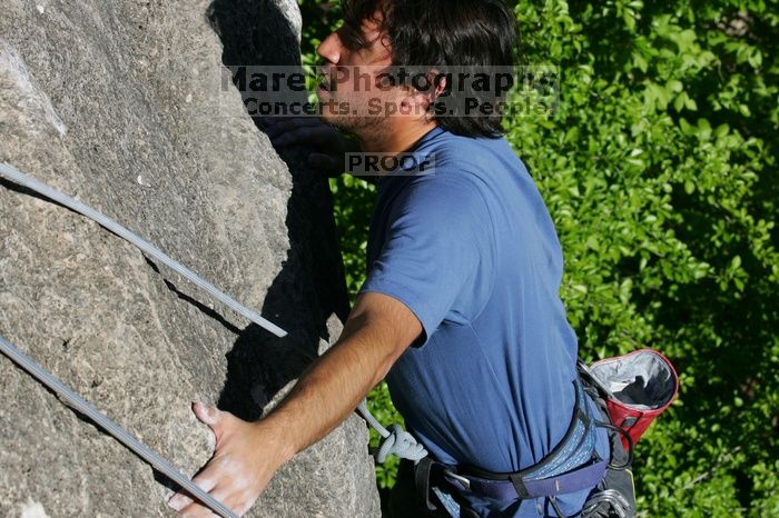 Javier Morales top rope climbing She's No Dog, She's My Wife (5.11b), shot from the top of Ack! (5.11b, but using the crack for the start instead) that I top roped up with my camera on my back.  It was another long day of rock climbing at Seismic Wall on Austin's Barton Creek Greenbelt, Sunday, April 5, 2009.

Filename: SRM_20090405_16482453.jpg
Aperture: f/10.0
Shutter Speed: 1/500
Body: Canon EOS-1D Mark II
Lens: Canon EF 80-200mm f/2.8 L