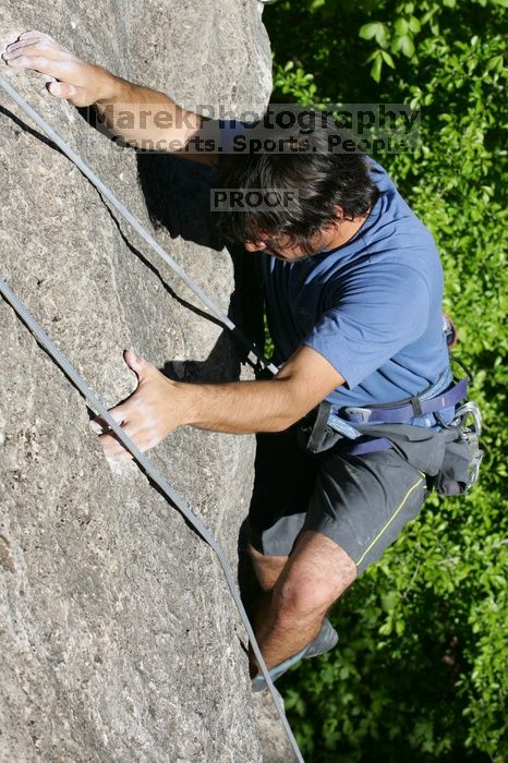 Javier Morales top rope climbing She's No Dog, She's My Wife (5.11b), shot from the top of Ack! (5.11b, but using the crack for the start instead) that I top roped up with my camera on my back.  It was another long day of rock climbing at Seismic Wall on Austin's Barton Creek Greenbelt, Sunday, April 5, 2009.

Filename: SRM_20090405_16483155.jpg
Aperture: f/8.0
Shutter Speed: 1/500
Body: Canon EOS-1D Mark II
Lens: Canon EF 80-200mm f/2.8 L