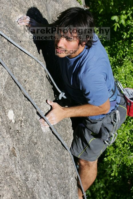 Javier Morales top rope climbing She's No Dog, She's My Wife (5.11b), shot from the top of Ack! (5.11b, but using the crack for the start instead) that I top roped up with my camera on my back.  It was another long day of rock climbing at Seismic Wall on Austin's Barton Creek Greenbelt, Sunday, April 5, 2009.

Filename: SRM_20090405_16483460.jpg
Aperture: f/9.0
Shutter Speed: 1/500
Body: Canon EOS-1D Mark II
Lens: Canon EF 80-200mm f/2.8 L