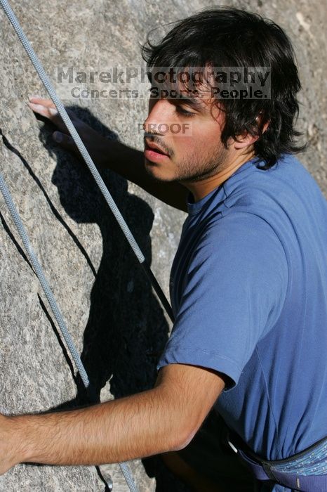 Javier Morales top rope climbing She's No Dog, She's My Wife (5.11b), shot from the top of Ack! (5.11b, but using the crack for the start instead) that I top roped up with my camera on my back.  It was another long day of rock climbing at Seismic Wall on Austin's Barton Creek Greenbelt, Sunday, April 5, 2009.

Filename: SRM_20090405_16485968.jpg
Aperture: f/10.0
Shutter Speed: 1/500
Body: Canon EOS-1D Mark II
Lens: Canon EF 80-200mm f/2.8 L