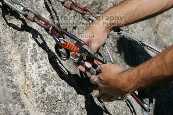 Javier Morales top rope climbing She's No Dog, She's My Wife (5.11b), shot from the top of Ack! (5.11b, but using the crack for the start instead) that I top roped up with my camera on my back.  It was another long day of rock climbing at Seismic Wall on Austin's Barton Creek Greenbelt, Sunday, April 5, 2009.

Filename: SRM_20090405_16500771.jpg
Aperture: f/11.0
Shutter Speed: 1/400
Body: Canon EOS-1D Mark II
Lens: Canon EF 80-200mm f/2.8 L