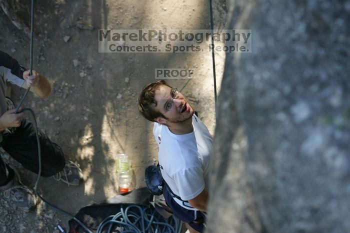 Me top roping Lick the Window (5.10c), shot by Javier Morales from the top of Ack! (5.11b, but using the crack for the start instead) that I top roped up with my camera on my back.  It was another long day of rock climbing at Seismic Wall on Austin's Barton Creek Greenbelt, Sunday, April 5, 2009.

Filename: SRM_20090405_17173484.jpg
Aperture: f/3.2
Shutter Speed: 1/400
Body: Canon EOS-1D Mark II
Lens: Canon EF 80-200mm f/2.8 L