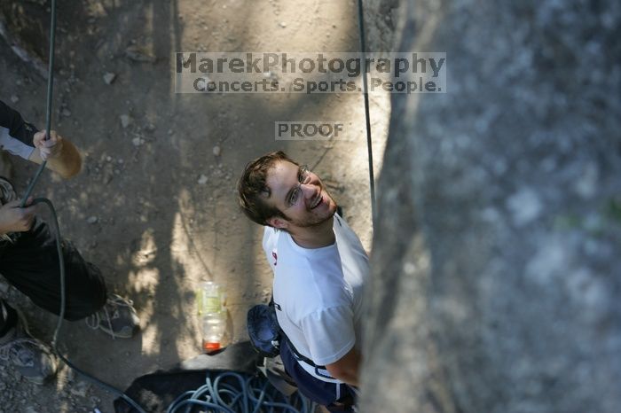 Me top roping Lick the Window (5.10c), shot by Javier Morales from the top of Ack! (5.11b, but using the crack for the start instead) that I top roped up with my camera on my back.  It was another long day of rock climbing at Seismic Wall on Austin's Barton Creek Greenbelt, Sunday, April 5, 2009.

Filename: SRM_20090405_17173585.jpg
Aperture: f/3.2
Shutter Speed: 1/400
Body: Canon EOS-1D Mark II
Lens: Canon EF 80-200mm f/2.8 L