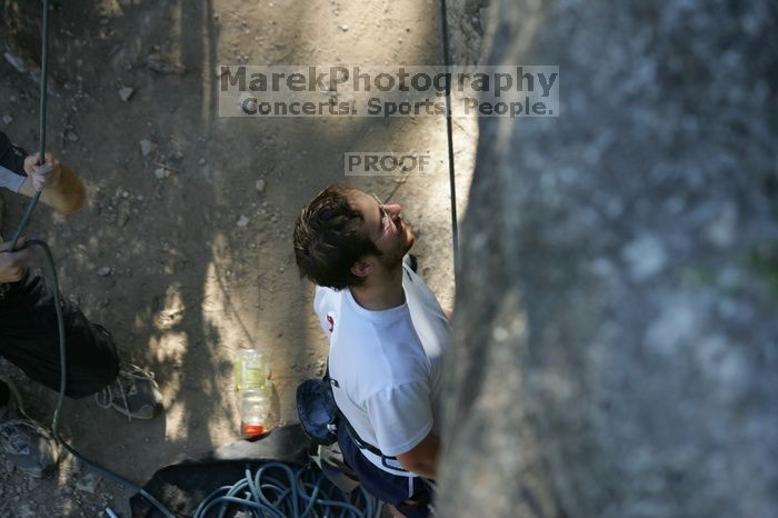 Me top roping Lick the Window (5.10c), shot by Javier Morales from the top of Ack! (5.11b, but using the crack for the start instead) that I top roped up with my camera on my back.  It was another long day of rock climbing at Seismic Wall on Austin's Barton Creek Greenbelt, Sunday, April 5, 2009.

Filename: SRM_20090405_17173588.jpg
Aperture: f/3.5
Shutter Speed: 1/400
Body: Canon EOS-1D Mark II
Lens: Canon EF 80-200mm f/2.8 L