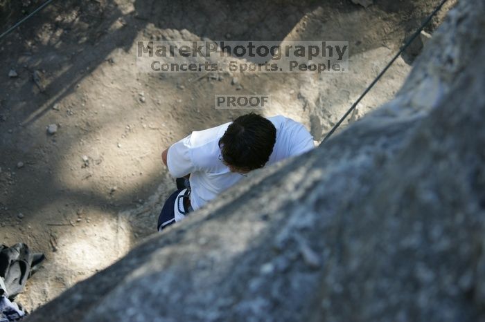 Me top roping Lick the Window (5.10c), shot by Javier Morales from the top of Ack! (5.11b, but using the crack for the start instead) that I top roped up with my camera on my back.  It was another long day of rock climbing at Seismic Wall on Austin's Barton Creek Greenbelt, Sunday, April 5, 2009.

Filename: SRM_20090405_17175894.jpg
Aperture: f/3.2
Shutter Speed: 1/400
Body: Canon EOS-1D Mark II
Lens: Canon EF 80-200mm f/2.8 L