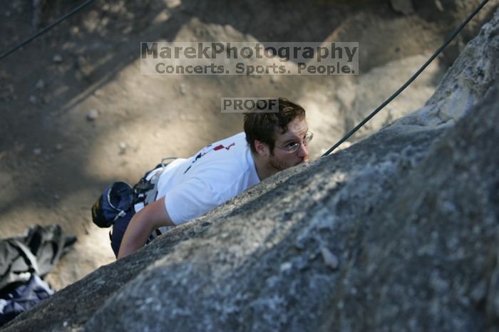 Me top roping Lick the Window (5.10c), shot by Javier Morales from the top of Ack! (5.11b, but using the crack for the start instead) that I top roped up with my camera on my back.  It was another long day of rock climbing at Seismic Wall on Austin's Barton Creek Greenbelt, Sunday, April 5, 2009.

Filename: SRM_20090405_17181500.jpg
Aperture: f/3.5
Shutter Speed: 1/400
Body: Canon EOS-1D Mark II
Lens: Canon EF 80-200mm f/2.8 L