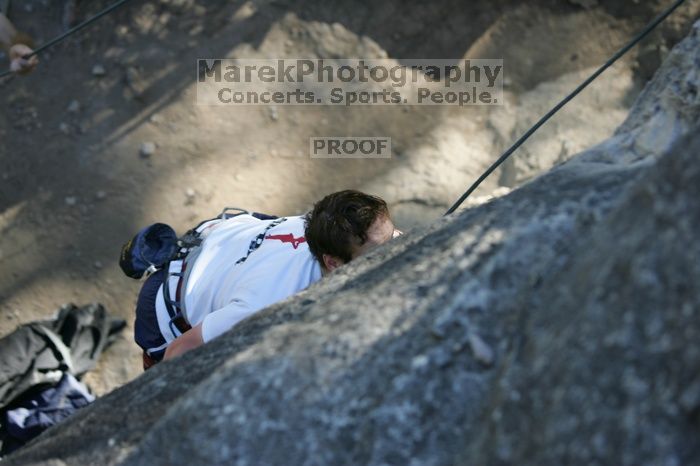 Me top roping Lick the Window (5.10c), shot by Javier Morales from the top of Ack! (5.11b, but using the crack for the start instead) that I top roped up with my camera on my back.  It was another long day of rock climbing at Seismic Wall on Austin's Barton Creek Greenbelt, Sunday, April 5, 2009.

Filename: SRM_20090405_17181599.jpg
Aperture: f/3.5
Shutter Speed: 1/400
Body: Canon EOS-1D Mark II
Lens: Canon EF 80-200mm f/2.8 L