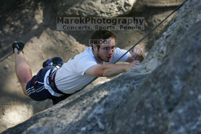 Me top roping Lick the Window (5.10c), shot by Javier Morales from the top of Ack! (5.11b, but using the crack for the start instead) that I top roped up with my camera on my back.  It was another long day of rock climbing at Seismic Wall on Austin's Barton Creek Greenbelt, Sunday, April 5, 2009.

Filename: SRM_20090405_17181605.jpg
Aperture: f/3.5
Shutter Speed: 1/400
Body: Canon EOS-1D Mark II
Lens: Canon EF 80-200mm f/2.8 L