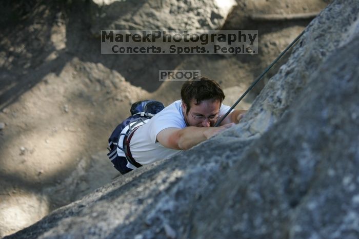 Me top roping Lick the Window (5.10c), shot by Javier Morales from the top of Ack! (5.11b, but using the crack for the start instead) that I top roped up with my camera on my back.  It was another long day of rock climbing at Seismic Wall on Austin's Barton Creek Greenbelt, Sunday, April 5, 2009.

Filename: SRM_20090405_17181711.jpg
Aperture: f/3.5
Shutter Speed: 1/400
Body: Canon EOS-1D Mark II
Lens: Canon EF 80-200mm f/2.8 L