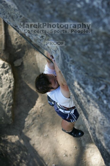 Me top roping Lick the Window (5.10c), shot by Javier Morales from the top of Ack! (5.11b, but using the crack for the start instead) that I top roped up with my camera on my back.  It was another long day of rock climbing at Seismic Wall on Austin's Barton Creek Greenbelt, Sunday, April 5, 2009.

Filename: SRM_20090405_17181713.jpg
Aperture: f/3.2
Shutter Speed: 1/400
Body: Canon EOS-1D Mark II
Lens: Canon EF 80-200mm f/2.8 L